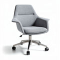 Gray upholstered office chair with adjustable height and rolling base